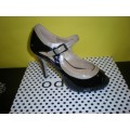 peep toe black patent / nude buckle heels